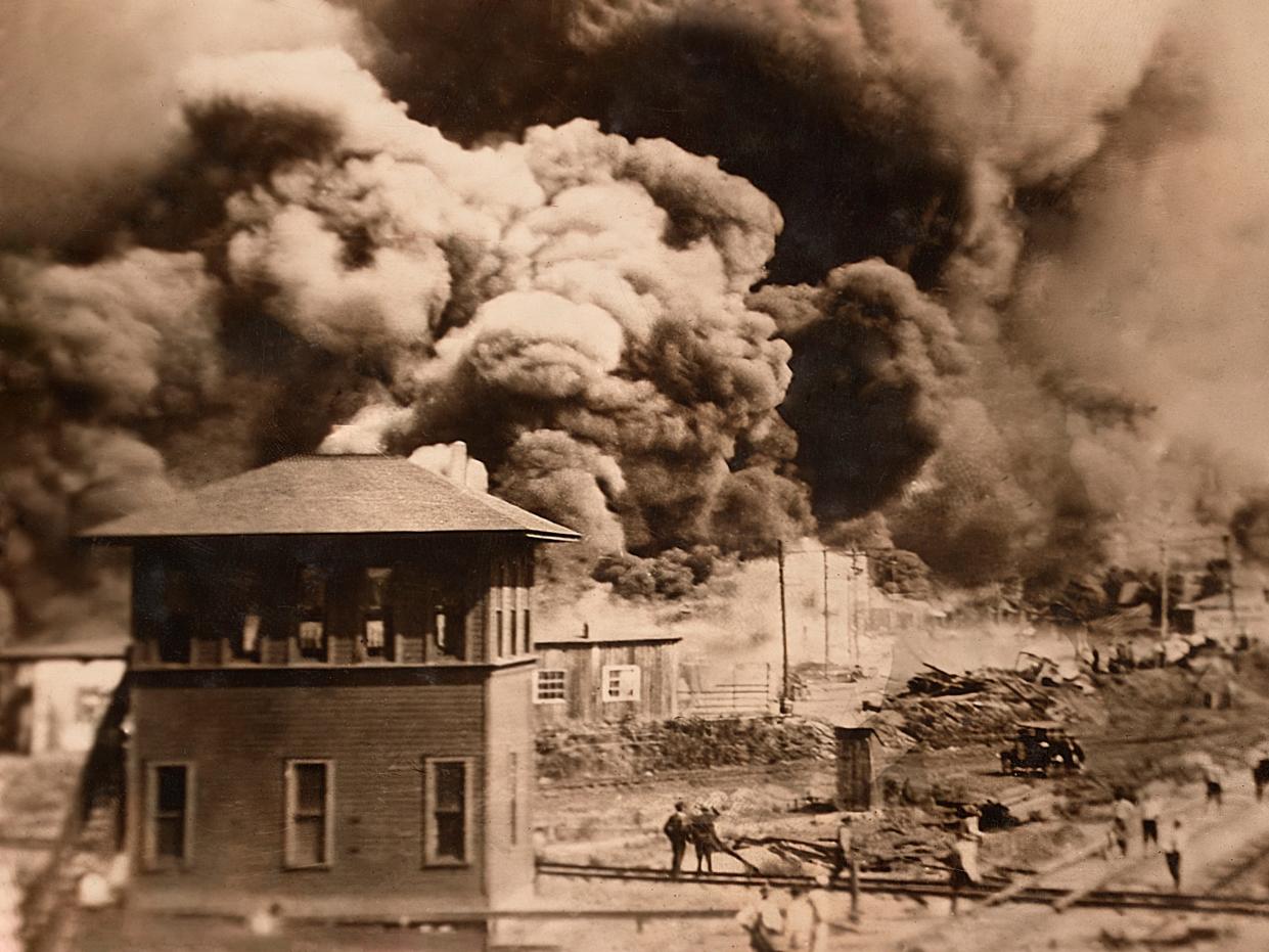 Buildings burning during Race Riots, Greenwood District, Tulsa, Oklahoma.