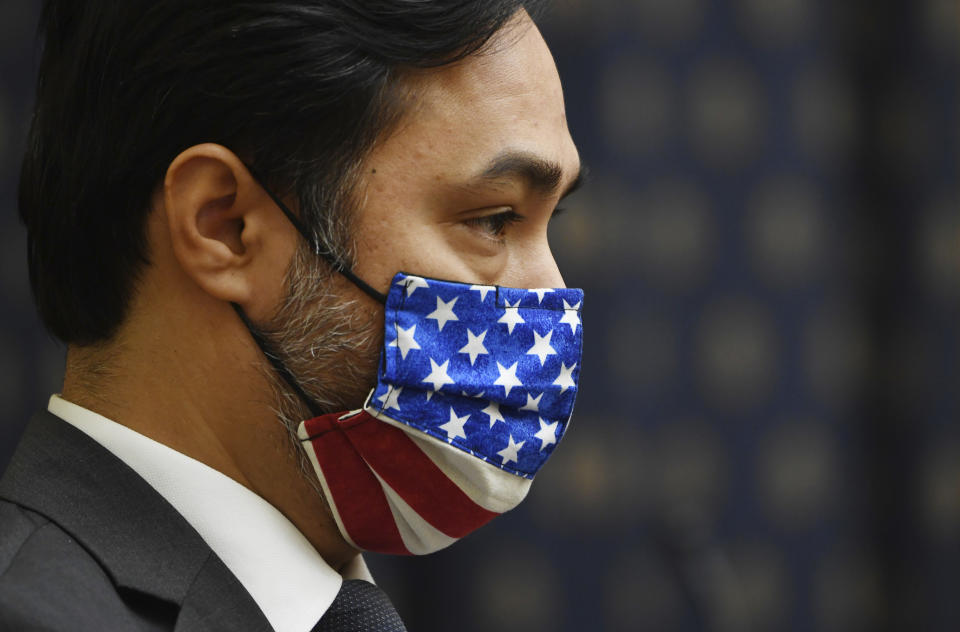 Vice Chair Rep. Joaquin Castro, D-Texas, wears a face mask during a House Committee on Foreign Affairs hearing looking into the firing of State Department Inspector General Steven Linick, Wednesday, Sept. 16, 2020 on Capitol Hill in Washington. (Kevin Dietsch/Pool via AP)