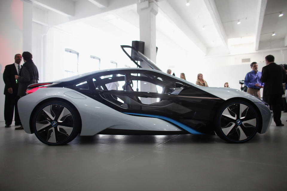BMW unveiled a pair of concept cars, one a hybrid and one electric, made of light-weight carbon fiber and a see-through glass exterior. The cars are expected to go into production within the next two to three years.