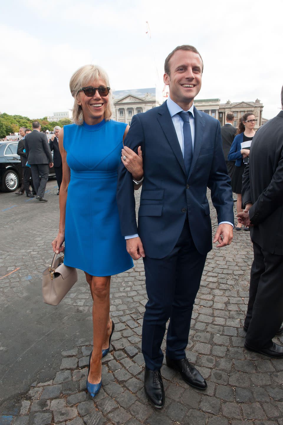 <p>In a blue ribbed-neck dress with snakeskin heels and sunglasses while attending Bastille Day with her husband in Paris, France. </p>