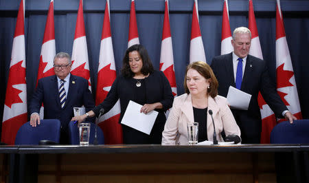 (L-R) Canada's Public Safety Minister Ralph Goodale, Justice Minister Jody Wilson-Raybould, Health Minister Jane Philpott and Bill Blair, the government's point man on the legalised marijuana file, arrive at a news conference in Ottawa, Ontario, Canada, April 13, 2017. REUTERS/Chris Wattie