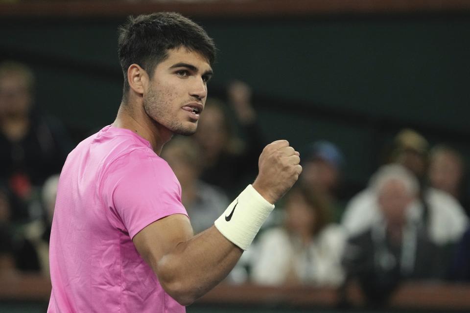 Carlos Alcaraz, of Spain, celebrates after winning a point over Thanasi Kokkinakis, of Australia, at the BNP Paribas Open tennis tournament Saturday, March 11, 2023, in Indian Wells, Calif. (AP Photo/Mark J. Terrill)