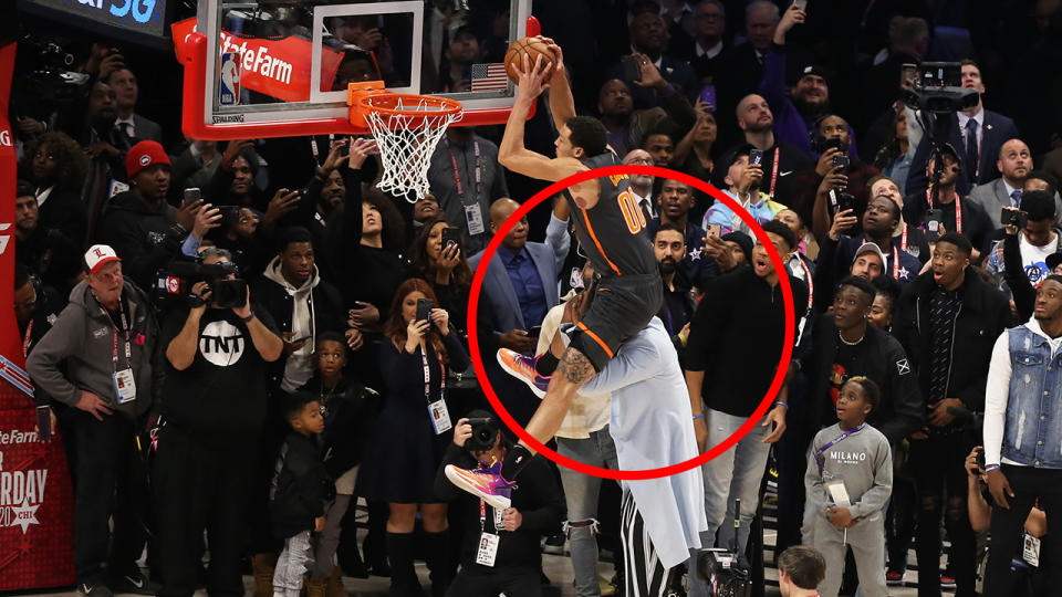 Orlando Magic star Aaron Gordon, pictured jumping over Tacko Fall at the 2020 NBA Dunk Contest.