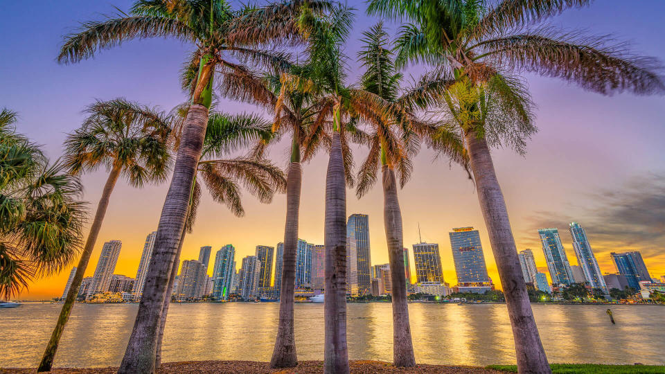 Miami, Florida, USA skyline on Bisayne Bay at dusk.