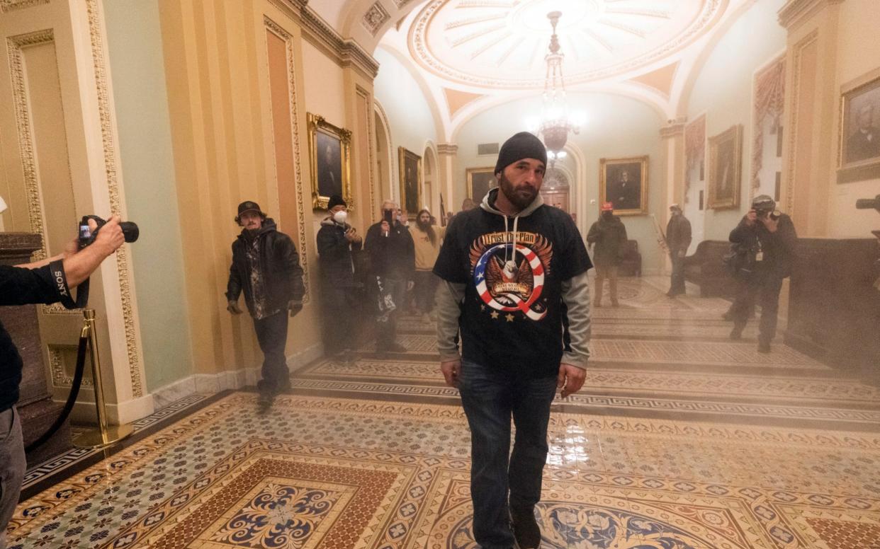  Donald Trump's supporters stormed the US Capitol earlier this month  - Manuel Balce Ceneta/AP