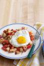<p>Replace corned beef with skinless turkey in this hash recipe to create a healthier alternative that your brunch guests will love.</p><p><strong><a href="https://www.countryliving.com/food-drinks/recipes/a3717/turkey-hash-sunny-side-up-eggs-recipe-clx1111/" rel="nofollow noopener" target="_blank" data-ylk="slk:Get the recipe;elm:context_link;itc:0;sec:content-canvas" class="link ">Get the recipe</a>.</strong></p>
