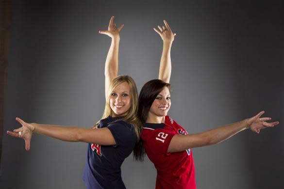 Synchronized swimmers Mariya Koroleva (L) and Mary Killman pose for a portrait during the 2012 U.S. Olympic Team Media Summit in Dallas, May 13, 2012.