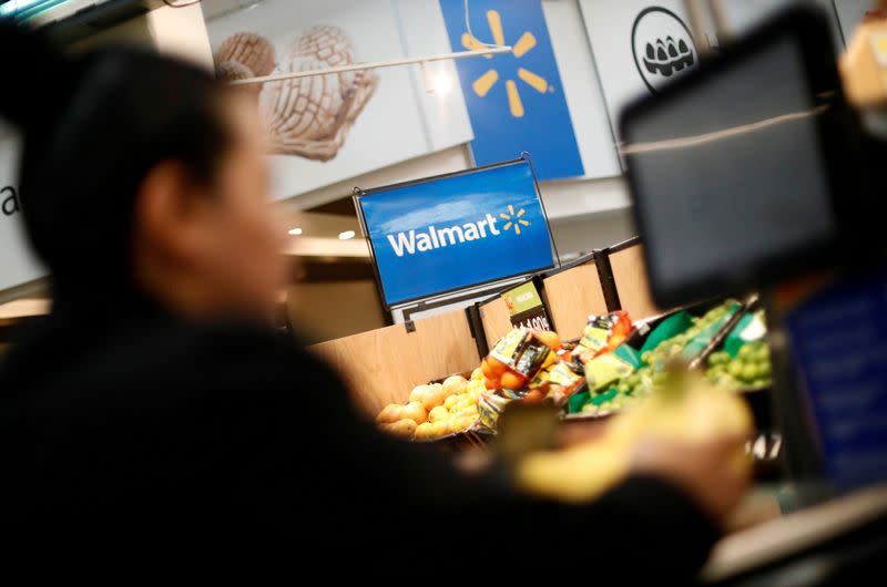 FILE PHOTO: A customer shops inside a Walmart store in Mexico City