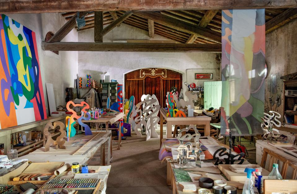 The artist's studio is filled with works in progress.