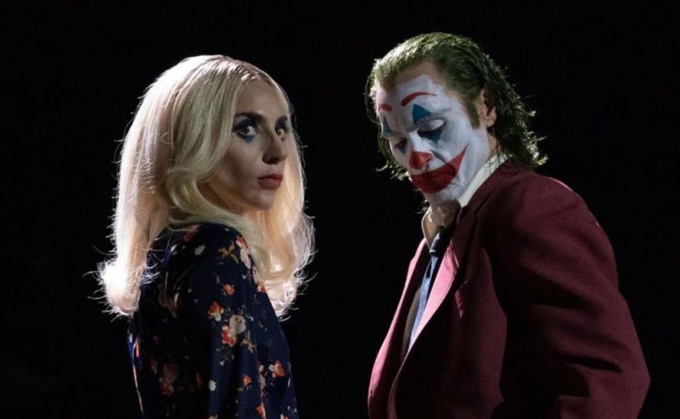 Lady Gaga and Joaquin Phoenix standing next to each other