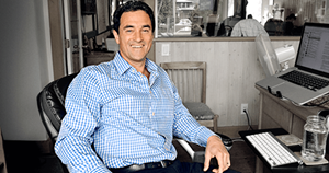 Mark Kaufmann, CEO & Co-founder of LingQ sits at his desk in the LingQ office