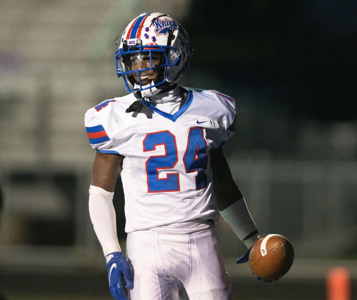 Sam Williams-Dixon celebrates after an easy touchdown run for the Knights.