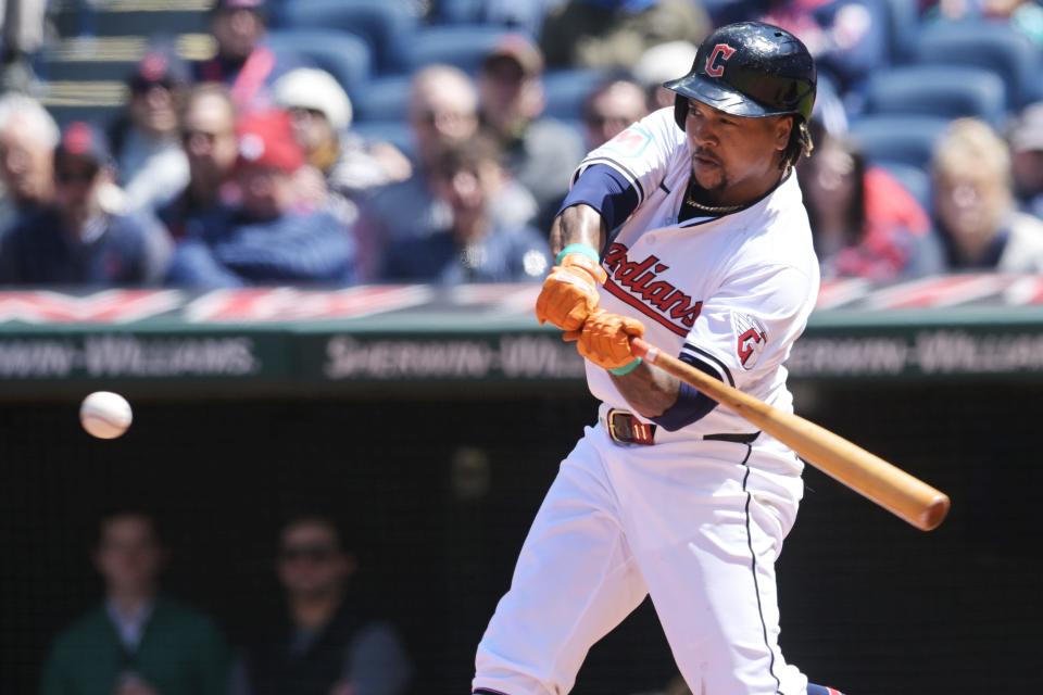 Apr 25, 2024; Cleveland, Ohio, USA; Cleveland Guardians designated hitter Jose Ramirez (11) hits a grand slam during the second inning against the Boston Red Sox at Progressive Field. Mandatory Credit: Ken Blaze-USA TODAY Sports