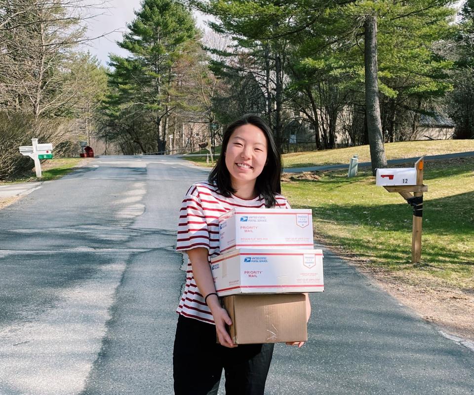 Rine (pictured) and Amy celebrate shipping their second batch of donated items to essential workers two weeks after launching their Give Essential platform. (Photo: )