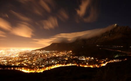 FILE PHOTO: Clouds blow over Cape Town's iconic Table Mountain in Cape Town