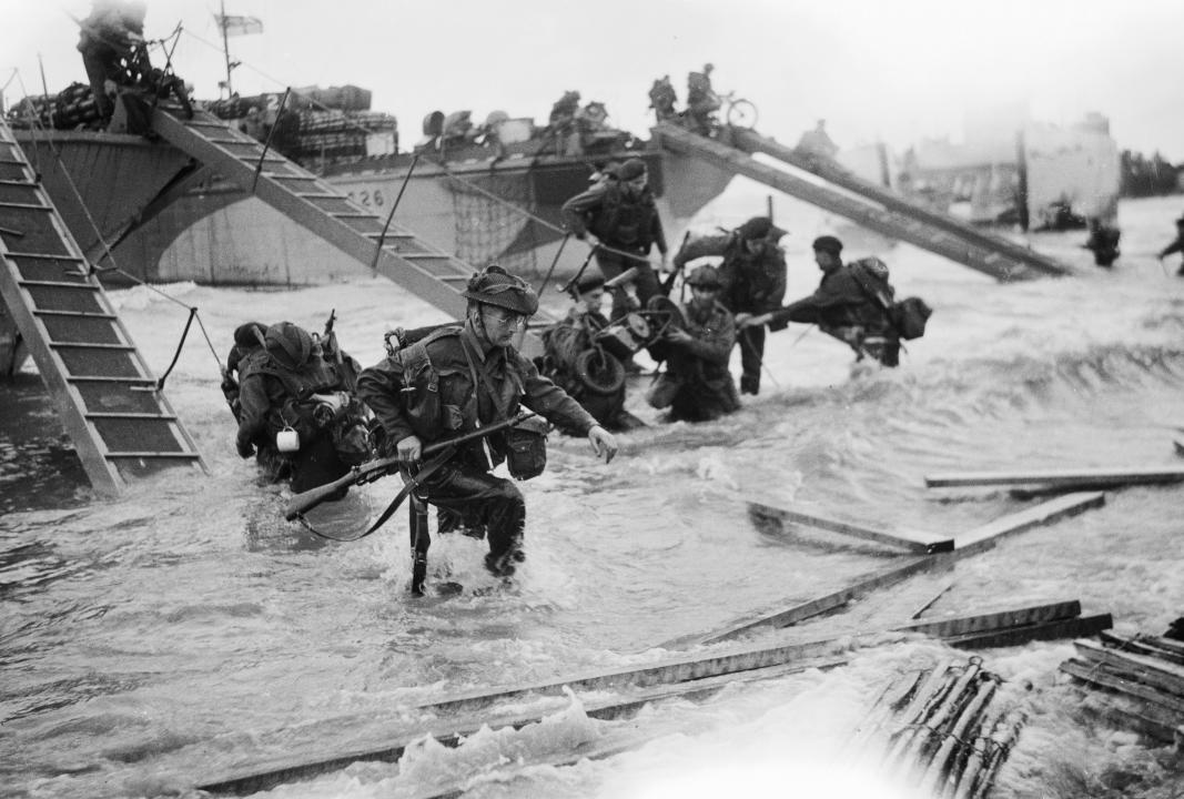 The British 2nd Army: Royal Marine Commandos of Headquarters, 4th Special Service Brigade, making their onto 'Nan Red' Beach, JUNO Area, at St Aubin-sur-Mer at about 9 am on, 6 June 1944. (Getty)