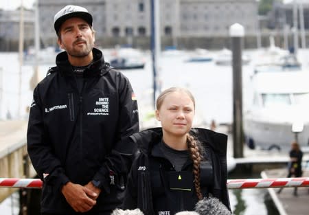 German yachtsman Boris Herrmann and Swedish teenage climate activist Greta Thunberg attend a news conference ahead of her trans-Atlantic boat trip to New York in Plymouth