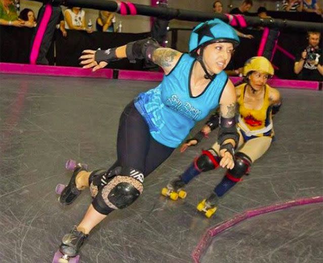 Bonnie Beck, also known in the roller derby community as Bonnie D. Stroir, is heavily tattooed and has a big personality - someone you wouldn't easily forget. Picture: Teresa Valencia Photography