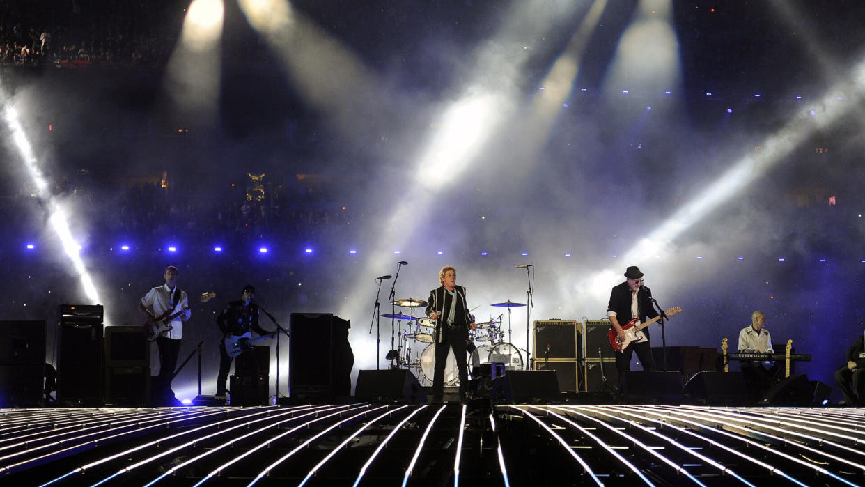 Roger Daltery(c) and Pete Townshend(r) of the who Perform During Halftime of Super Bowl Xliv in Miami Florida Usa 07 February 2010 at Sun Life Stadium During Super Bowl Xliv in Miami Florida Usa 07 February 2010 the New Orleans Saints Will Play the Indianapolis Colts in American Football's Annual Championship Game United States MiamiUsa American Football Super Bowl - Feb 2010.