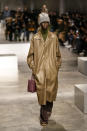 A model wears a creation as part of the men's Fendi Fall-Winter 2024-2025 collection, that was presented in Milan, Italy, Saturday, Jan. 13, 2024. (AP Photo/Antonio Calanni).