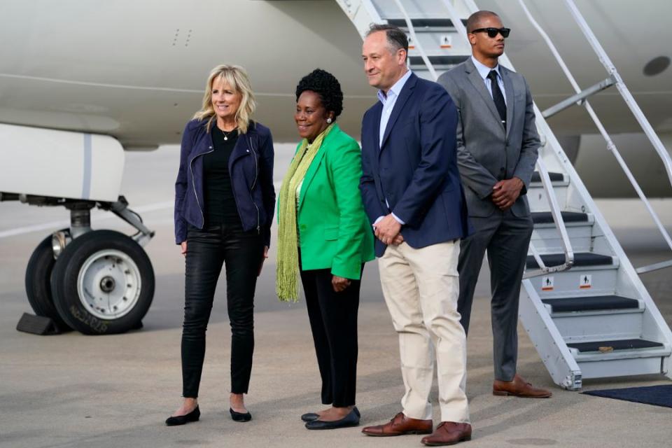 First lady Jill Biden poses for a photo with Doug Emhoff and Rep. Sheila Jackson Lee, D-Texas, as she arrives at William P. Hobby Airport in Houston, June 29. - Credit: AP