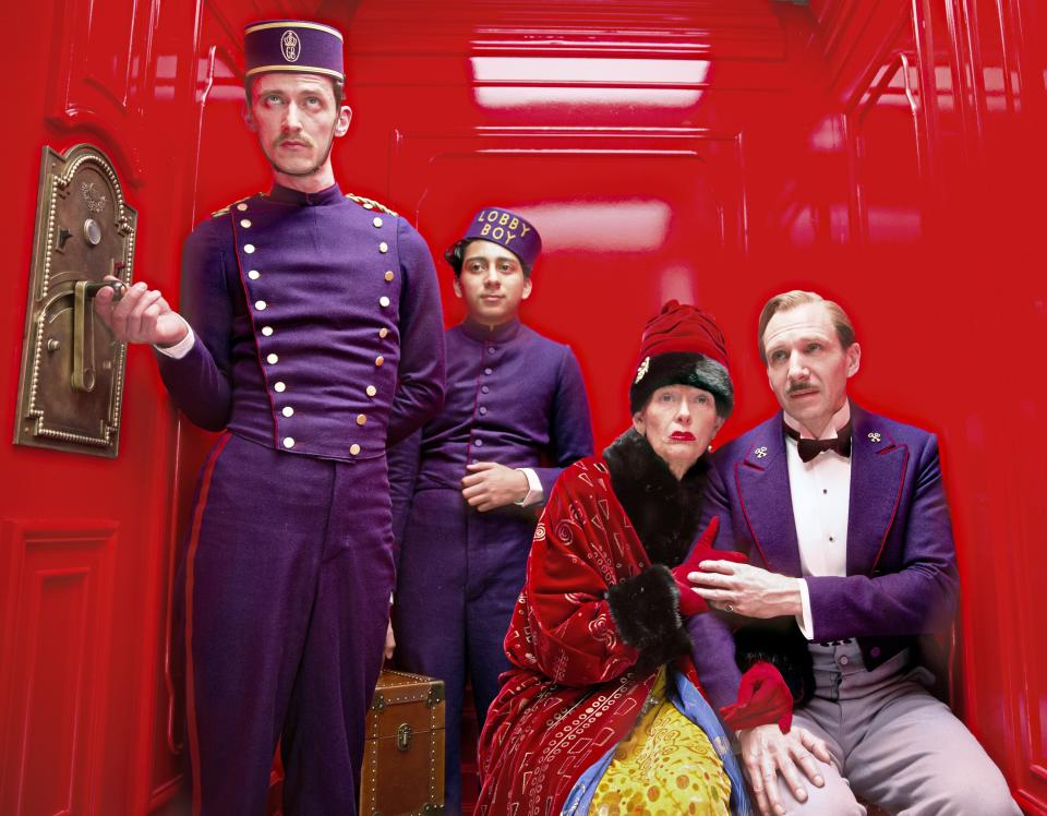 <h1 class="title">THE GRAND BUDAPEST HOTEL, from left: Paul Schlase, Tony Revolori, Tilda Swinton, Ralph Fiennes, 2014</h1><cite class="credit">©Fox Searchlight/Courtesy Everett Collection</cite>