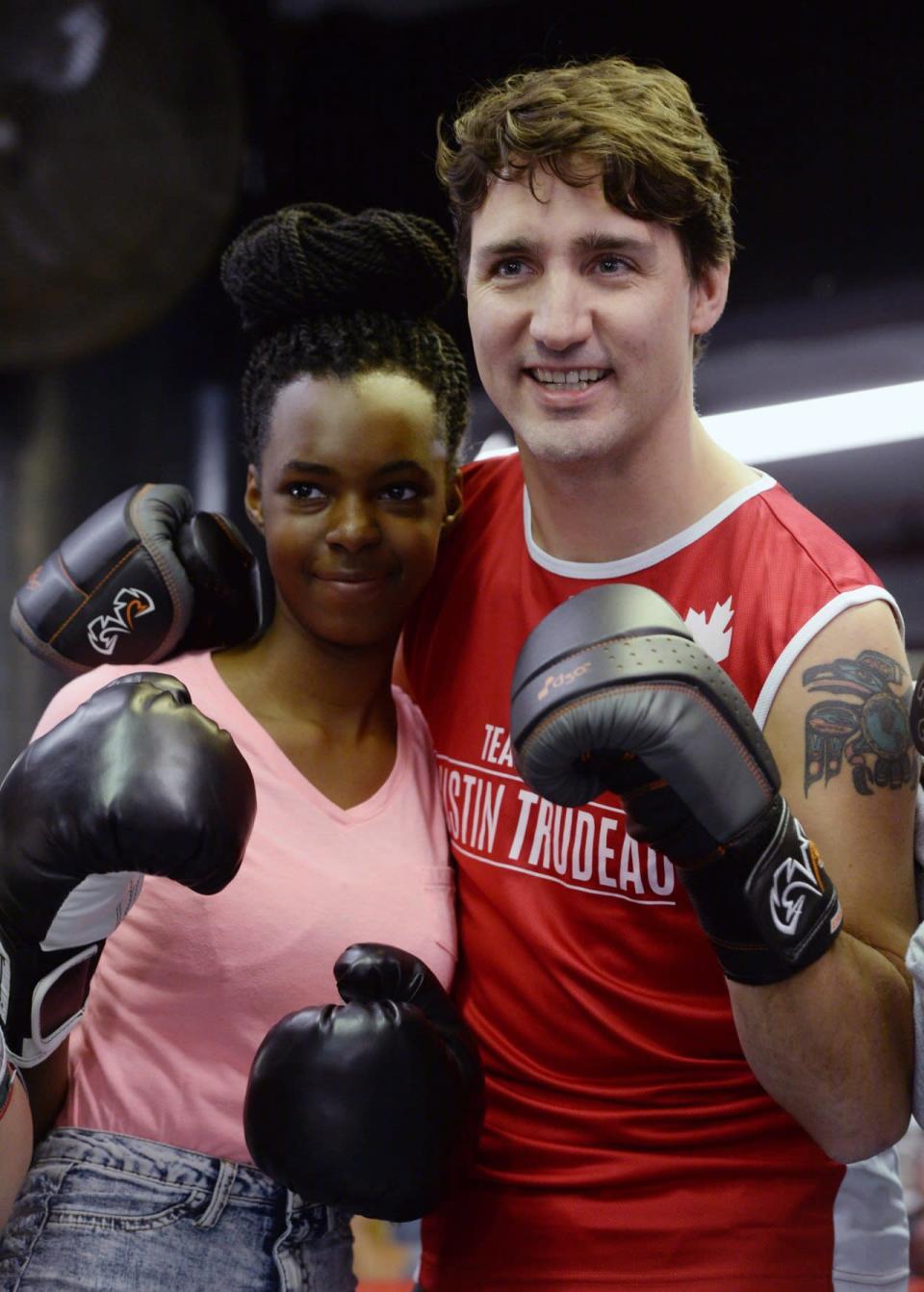 Prime Minister Justin Trudeau poses for a photo with Ayanna, 14, as he visits Gleason’s Boxing Gym in Brooklyn, New York on Thursday, April 21, 2016. THE CANADIAN PRESS/Sean Kilpatrick