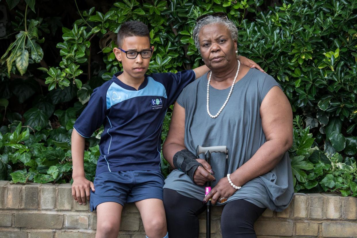 Rukayet Mamudu, 69, and her adopted son, Tyrshondre, 12: Alex Lentati