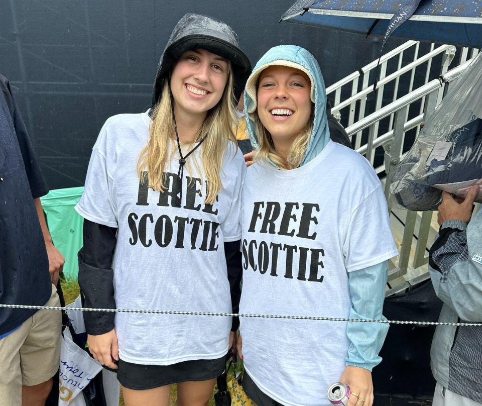 Two golf fans at the 2024 PGA Championship wear "Free Scottie" T-shirts at Valhalla Golf Club. (Photo: Adam Schupak/Golfweek)