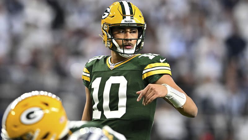 Green Bay Packers QB Jordan Love sets the play during an NFL wild-card playoff game against the Dallas Cowboys on Sunday, Jan. 14, 2024, in Arlington, Texas.