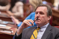 State Sen. Scott Wilk, R-Santa Clarita listens as members speak on a bill to reduce the state b, dget deficit at the Capitol in Sacramento, Calif., Thursday,, April 11, 2024. Republican lawmakers opposed the bill saying it only delays dealing with the budget deficit. Both houses approved the bill that takes a number of steps to reduce the state budget deficit by about $17 billion. Gov. Gavin Newsom has said the deficit is about $38 billion.(AP Photo/Rich Pedroncelli)