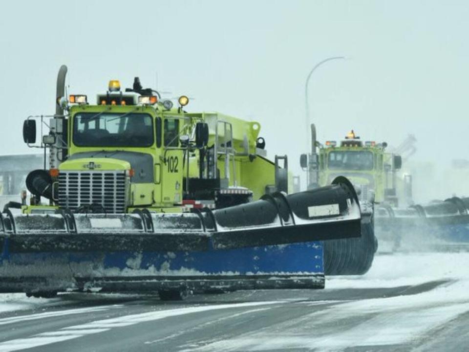 Snow removal and de-icing crews are seen at work on the runways at Vancouver International Airport (YVR) on Dec. 25, 2021, amidst unusually cold temperatures from an Arctic outflow. (Vancouver International Airport (YVR)/Twitter - image credit)