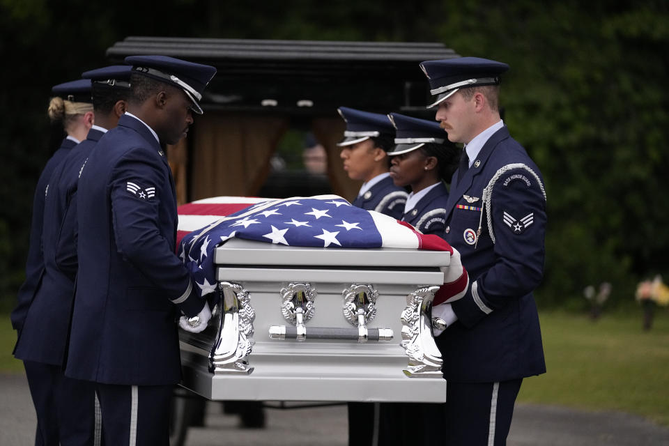 Airman Roger Fortson's casket is carried during the interment for Fortson at Lincoln Memorial Cemetery, Friday, May 17, 2024, in Atlanta. (AP Photo/Brynn Anderson)