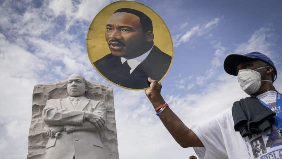 Participants in the March on Washington conclude their march from the Lincoln Memorial to the Martin Luther King Jr. Memorial August 28, 2020 in Washington, DC. Today marks the 57th anniversary of Rev. Martin Luther King Jr.’s “I Have A Dream” speech. (Photo by Drew Angerer/Getty Images)