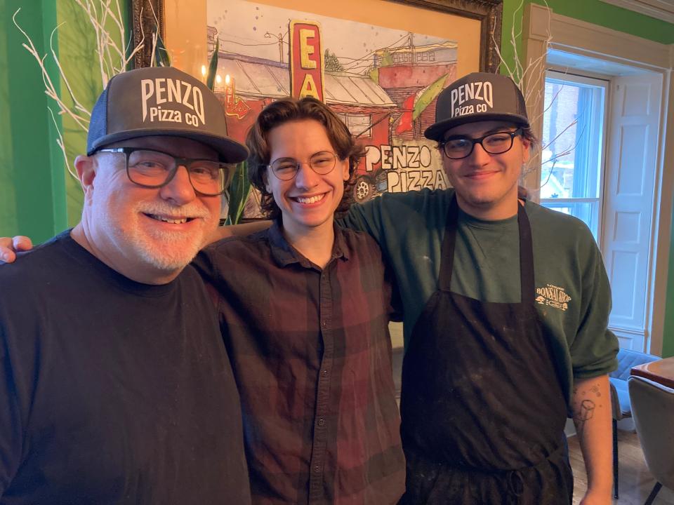 From left to right, Penzo Pizza owner Dave Penzo and his sons Tyler and Luke Penzo stand in a dining room at the Montpelier restaurant Oct. 17, 2023.