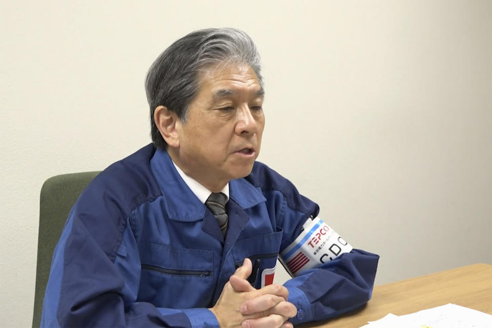 In this image made from video provided by Tokyo Electric Power Company Holdings (TEPCO), Akira Ono, chief decommissioning officer, president of the Fukushima Daiichi nuclear power plant, speaks during an online interview with The Associated Press on Wednesday, March 2, 2022. Ono said in a recent online interview that robotic probes at Unit 1 and 2 this year are a major "step forward" in the decades-long cleanup. (TEPCO via AP)