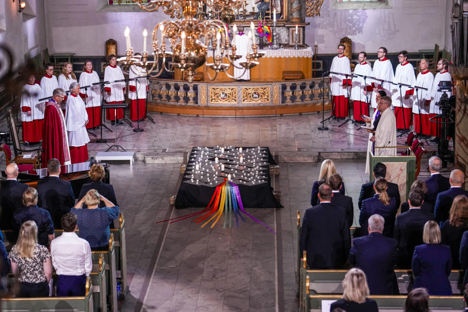 A service in Oslo Cathedral, Oslo, Sunday June 26, 2022, after an attack in Oslo on Saturday. A gunman opened fire in Oslo’s nightlife district early Saturday, killing two people and leaving more than 20 wounded in what the Norwegian security service called an "Islamist terror act" during the capital’s annual LGBTQ Pride festival. (Javad Parsa/NTB via AP)