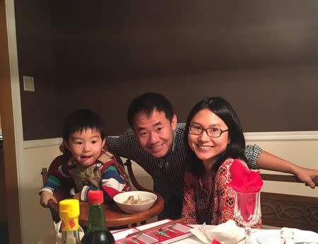 Xiyue Wang, a naturalized American citizen from China, arrested in Iran last August while researching Persian history for his doctoral thesis at Princeton University, is shown with his wife and son in this family photo released in Princeton, New Jersey, U.S. on July 18, 2017. Courtesy Wang Family photo via Princeton University/Handout via REUTERS/Files