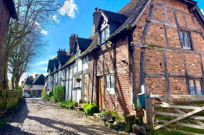 Timber framed cottages and cobbled lanes in Great Budworth -Credit:MEN