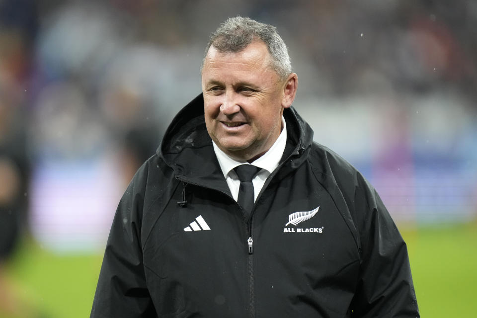 New Zealand's head coach Ian Foster smiles prior the start of the Rugby World Cup semifinal match between Argentina and New Zealand at the Stade de France in Saint-Denis, outside Paris, Friday, 20, 2023. (AP Photo/Pavel Golovkin)