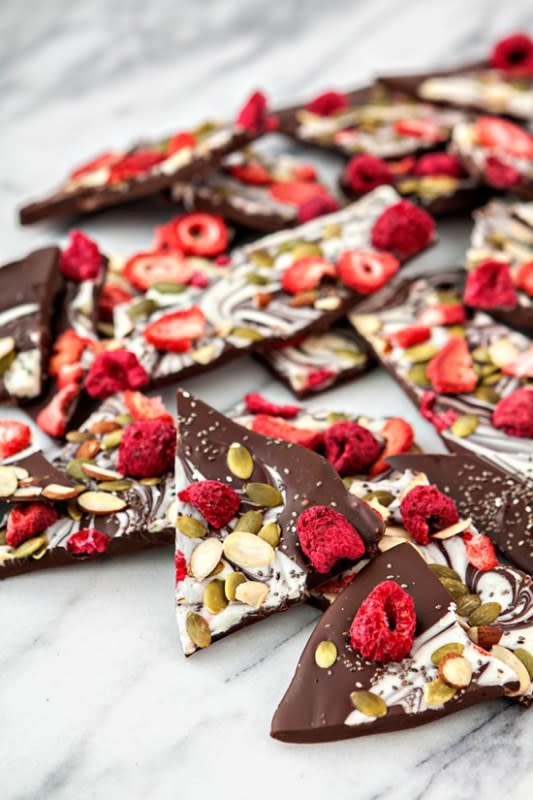 <p>Good Life Eats</p><p>This dark and white chocolate swirled bark is loaded with tasty super foods: berries, almonds, chia seeds, and pumpkin seeds.</p><p><strong>Get the recipe:</strong><a href="https://www.goodlifeeats.com/bittersweet-chocolate-swirl-fruit-and-nut-bark/" rel="nofollow noopener" target="_blank" data-ylk="slk:Bittersweet Chocolate Swirl Fruit and Nut Bark;elm:context_link;itc:0;sec:content-canvas" class="link "><strong>Bittersweet Chocolate Swirl Fruit and Nut Bark</strong></a></p>