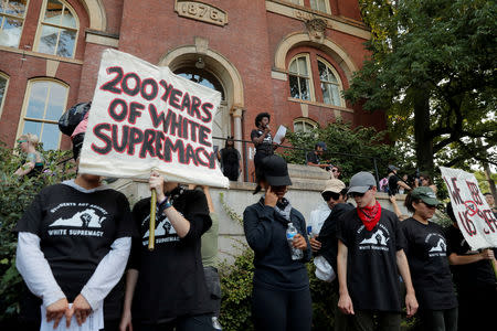 FILE PHOTO: Protesters gather at the University of Virginia, ahead of the one year anniversary of the 2017 Charlottesville "Unite the Right" protests, in Charlottesville, Virginia, U.S., August 11, 2018. REUTERS/Lucas Jackson/File Photo