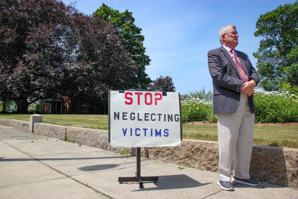 Robert Hoatson of Road to Recovery stands outside the Diocese of Fall River's headquarters and the residence of Bishop Edgar da Cunha on Highland Avenue on June 26, 2024, to talk about allegations of sexual abuse against the Rev. Jay Mello.