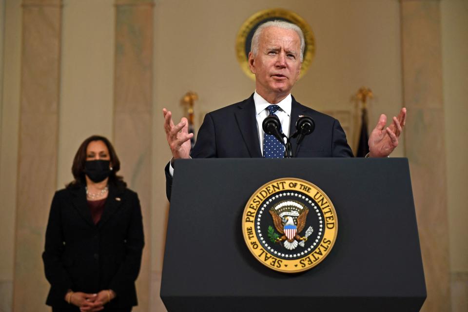 Vice President Kamala Harris (L) listens as US President Joe Biden delivers remarks on the guilty verdict against former policeman Derek Chauvin at the White House in Washington, DC, on April 20, 2021. - Derek Chauvin, a white former Minneapolis police officer, was convicted on April 20 of murdering African-American George Floyd after a racially charged trial that was seen as a pivotal test of police accountability in the United States. (Photo by Brendan Smialowski / AFP) (Photo by BRENDAN SMIALOWSKI/AFP via Getty Images)