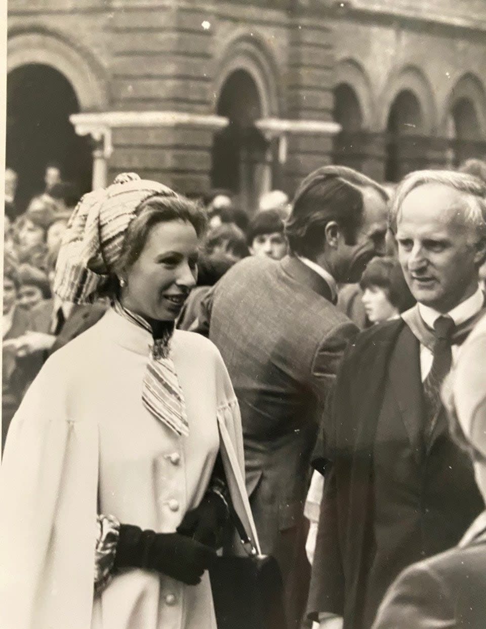 Princess Anne with Ellis during a visit to Marlborough in 1978; Captain Mark Phillips, in the background, attended the school