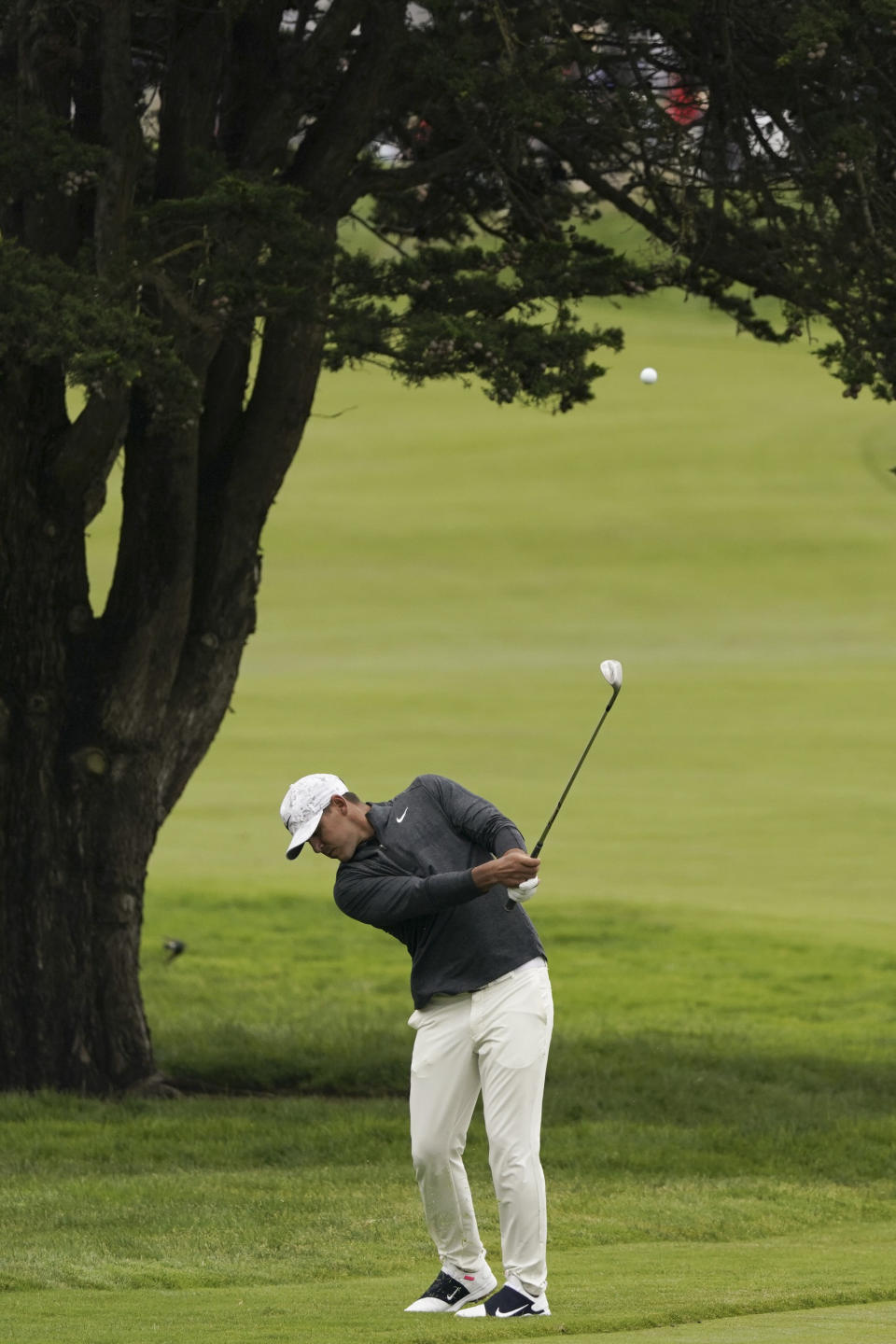 Brooks Koepka hits from the fairway on the 14th hole during the third round of the U.S. Open golf tournament Saturday, June 15, 2019, in Pebble Beach, Calif. (AP Photo/Carolyn Kaster)