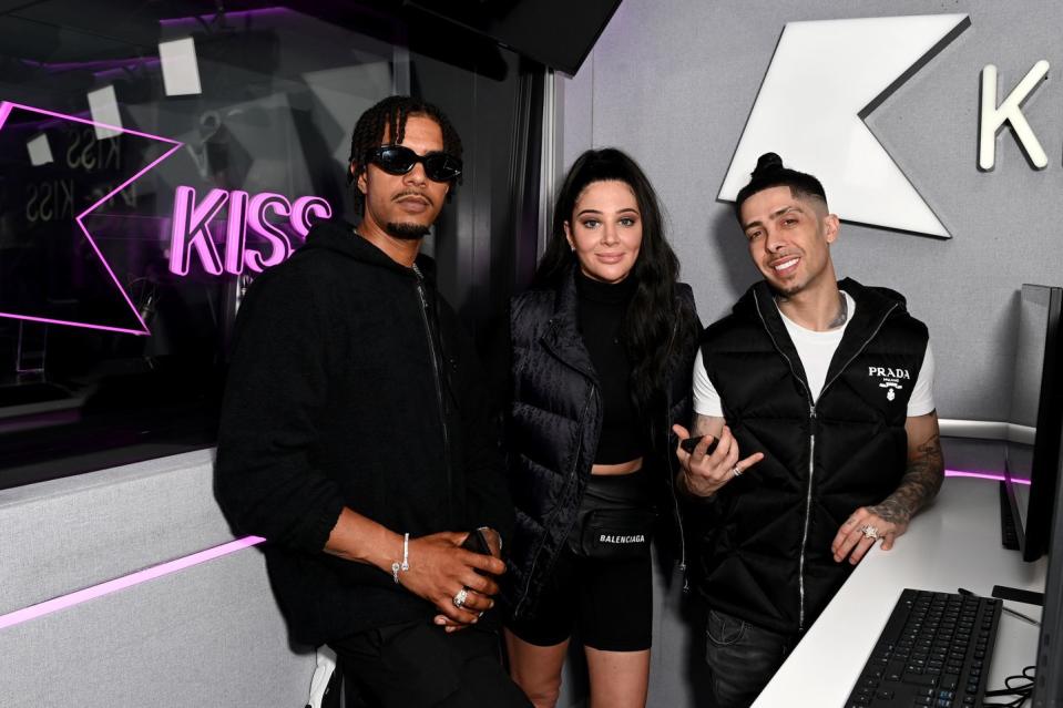 fazer, tulisa and dappy of n dubz standing in a radio studio