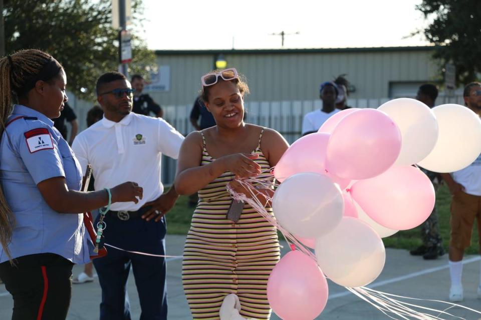 Pink and white balloons were released outside of a funeral home for Ivy Pierce, 4, and her sister, 1-year-old Wynter Thouston. They were killed in a shooting outside of a car wash in Fort Worth on July 4, 2024.