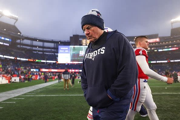 FOXBOROUGH, MASSACHUSETTS - DECEMBER 03: Head coach Bill Belichick of the New England Patriots walks off the field after losing to the Los Angeles Chargers 6-0 at Gillette Stadium on December 03, 2023 in Foxborough, Massachusetts. (Photo by Maddie Meyer/Getty Images)