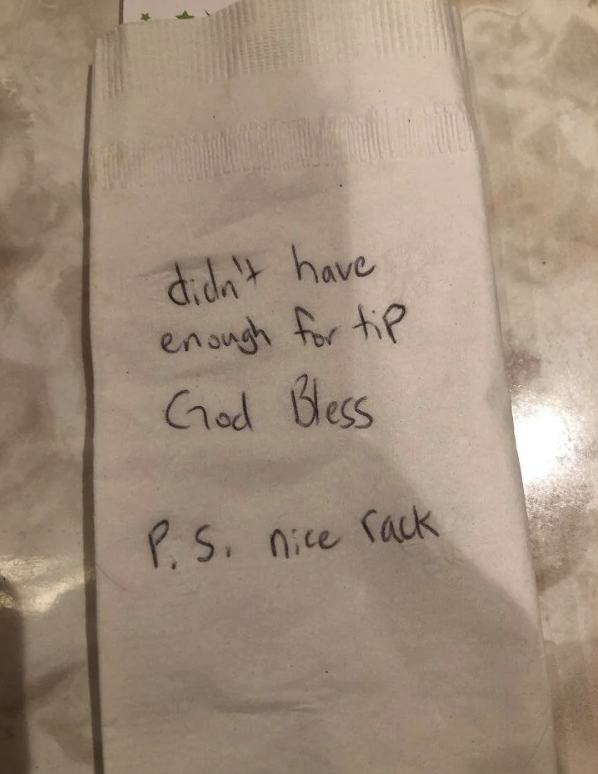 Handwritten note on a napkin reads: "didn't have enough for tip. God Bless. P.S. nice rack"